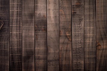Top view of dark brown and black wood texture background, wooden table.