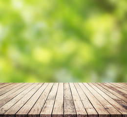 old wood plank with abstract green blurred background for product display