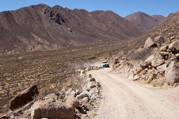 Car along the road to Angastaco, Argentina
