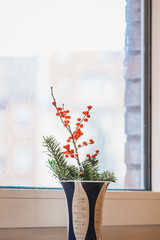 small christmas branch with red berries