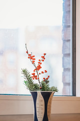 small christmas branch with red berries
