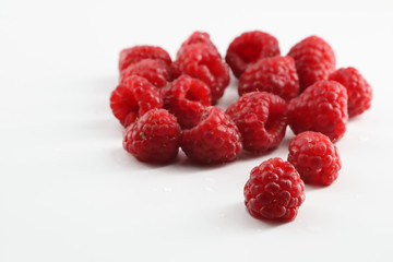 fresh raspberries isolated on white background