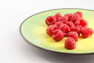 fresh raspberries in a bowl