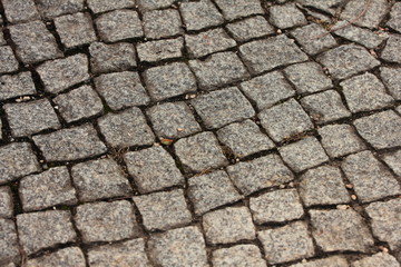 Granite cube, Overhead view of cobblestone street texture