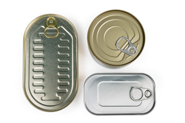 Top view of different sealed tin cans of canned fish