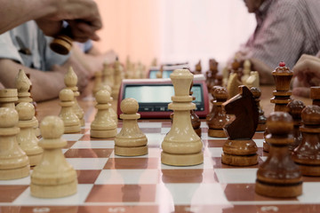 Men play chess. Gameplay. Development of the concept of intellectual game, attraction of masses to...