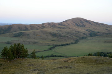  An evening in the Altai mountains near the Charysh River. Western Siberia