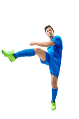 Asian football player man in the pose of kicking the ball © Leo Lintang