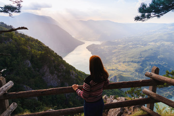 Sunset and dramatic sky above lake Perucac mountain Tara
