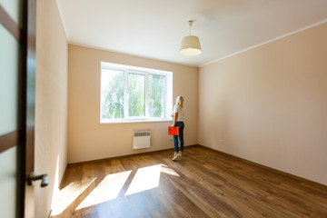girl empty room, moving home