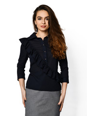 Young beautiful woman posing in new casual office blouse 