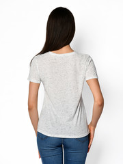 Young beautiful woman posing in new casual office blouse 