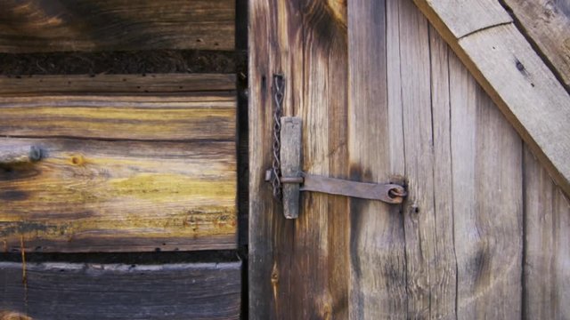Close up of a beautiful vintage wooden shed door