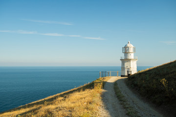 Fototapeta na wymiar Road Path To Meganom Lighthouse On Cape Meganom In Crimea.
