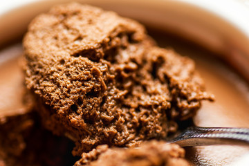 Spoonful of Chocolate Mousse in White Cup Bowl with Creamy Spongy Texture. Scrumptious Dessert 