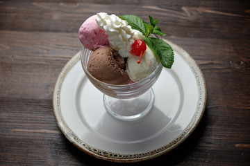 Colored ice cream balls . Restaurant menu