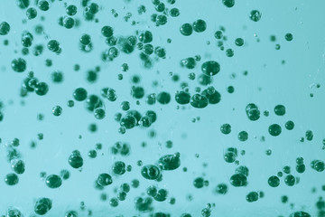 Abstract of blue focused oil drops