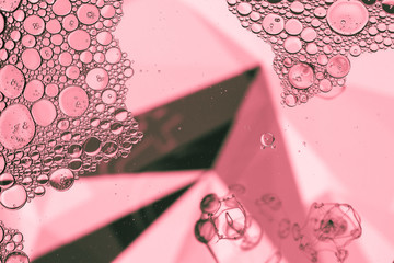Abstract pyramid with bubbles in pink