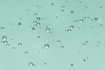 Plain blue raindrops background