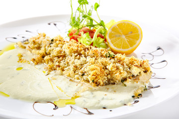 Breaded Pike Perch or Zander Fillet with Cream Sauce Isolated