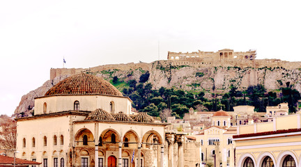 Monastiraki square, Tzistarakis Mosque and Acropolis in Athens,Greece