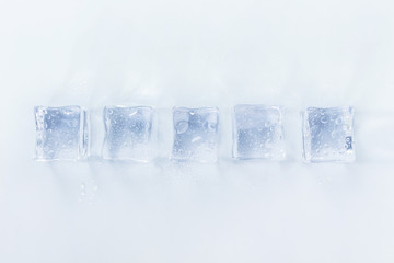 group ice cubes on white background.