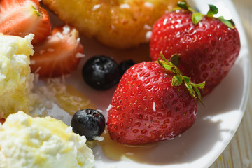 strawberries on a plate with dessert Breakfast
