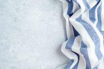 High Angle View of kitchen cloth napkin on gray background with copy space
