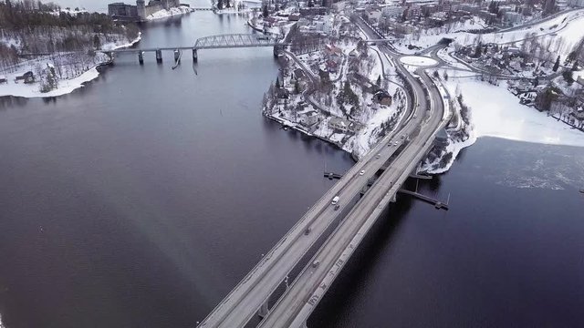 Traffic on highway bridge over lake in Savonlinna, Finland.