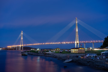 Vladivostok, Russia. Night landscape with views of the Russian bridge.