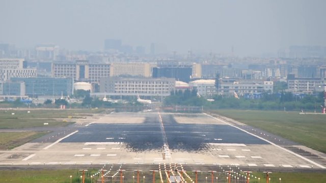 Commercial airplane landing at Chengdu International airport, Sichuan province, China