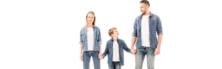 panoramic shot of boy holding hands with parents isolated on white