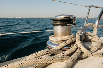 Fototapeta premium Rope on yacht board on ocean. Sport, vacation, travel, summer activity concept 