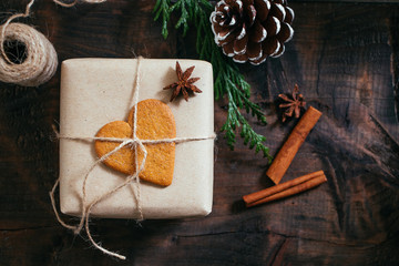 Rustic Christmmas present with gingerbread cookie