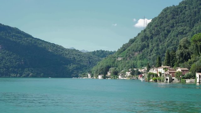 Landscape shot on Lake Lugano from a boat in Morcote