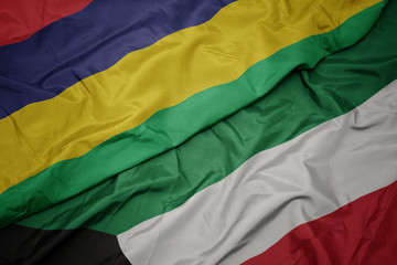 waving colorful flag of kuwait and national flag of mauritius.