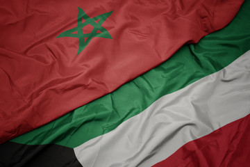 waving colorful flag of kuwait and national flag of morocco.