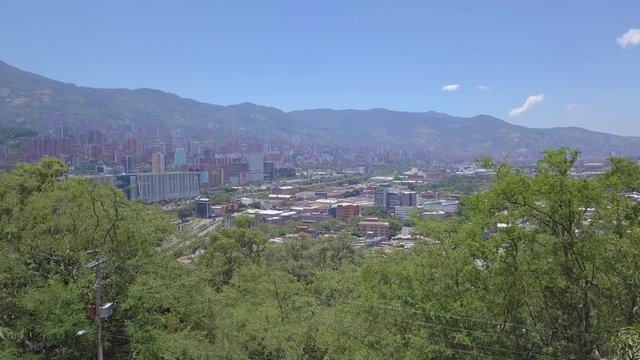 Static 4k shot of view of city of Medellin in summer day