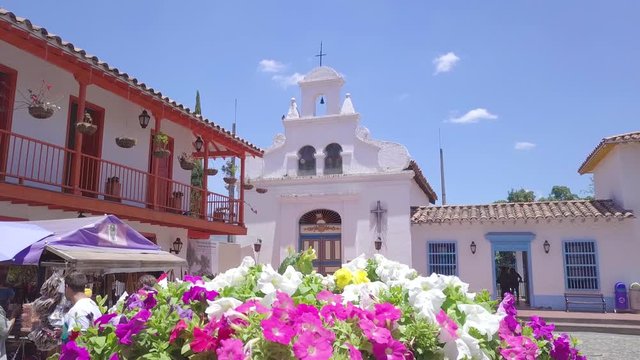 Steady 4k shot of flowers and church in Pueblito Paisa, Cerro Nutibara