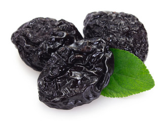 Prunes on white background