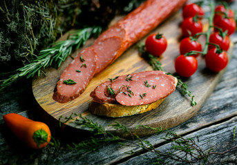 Vegan sausage bruschettas on ecological wooden background