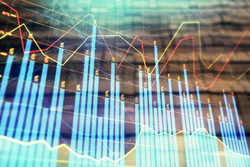 Financial chart hologram with abstract background. Double exposure. Concept of market analysis