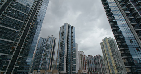 Modern building in city with storm of the cloud