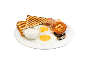 Traditional breakfast plate with eggs and toast