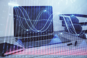 Stock market chart and desktop office computer background. Multi exposure. Concept of financial...