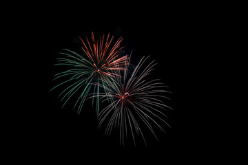 Fototapeta premium Colorful fireworks in night sky background