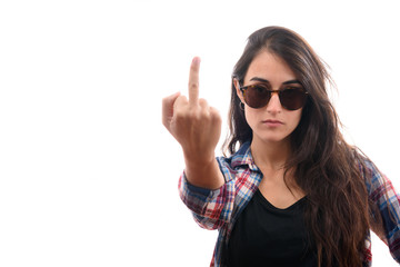 Caucasian young girl with plaid shirt and sunglasses say no with her finger and serious face.