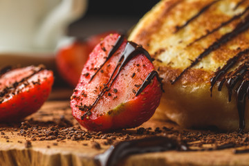 strawberry with chocolate on a plate with dessert Breakfast