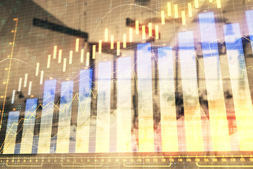 Stock and bond market graph with trading desk bank office interior on background. Multi exposure. Concept of financial analysis