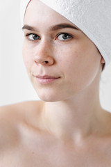 Fresh Young Woman Wrapped with Towels After Bath. Spa, skincare, beauty, cosmetics, wellness concept